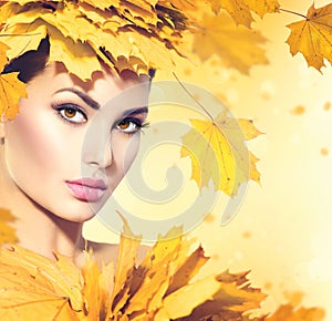 Autumn woman with yellow leaves hair style