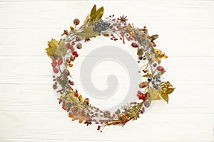Autumn Wreath Flat Lay. Fall leaves in circle with berries,nuts,