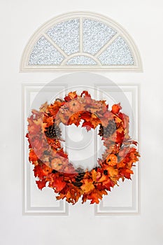 Autumn Wreath Hanging on White Door