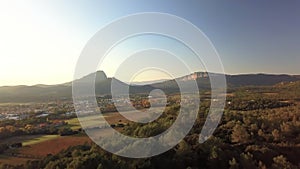 Autumnal aerial view of Pic Saint Loup at sunset, Saint Mathieu de TrÃ©viers, Hearult, Occitanie, France