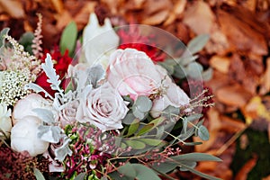 Autumnal bridal bouquet. bride holding wedding bouquet