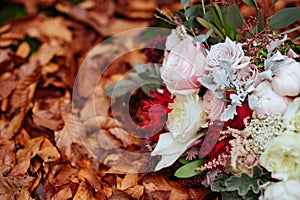 Autumnal bridal bouquet. bride holding wedding bouquet
