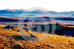 The autumnal grassland sunset