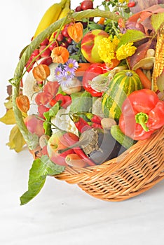Autumnal harvest vegetable and fruit in basket