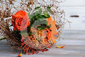 Autumnal orange bouquet with rosa and gerbera