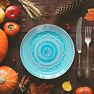 Autumnal table setting for Halloween or Thanksgiving day