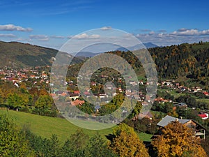 Autumnal view with Moieciu de Jos - touristic village in Carpathian Mountains, Romania