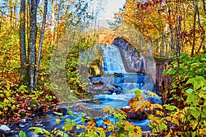 Autumnal Waterfall and Forest Stream in Michigan