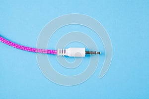 Aux wire on a blue background