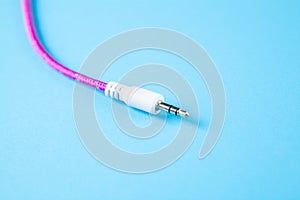 Aux wire on a blue background