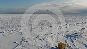 Auxiliary facilities with equipment at an oil field on the shores of arctic ocean.