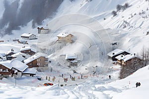 avalanche buries ski resort, with snow and debris covering the slopes