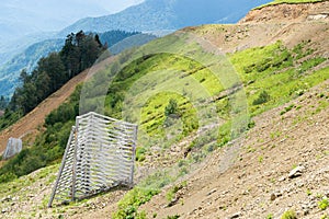 Avalanche cutter - engineering device to reduce damage from avalanches in the mountains