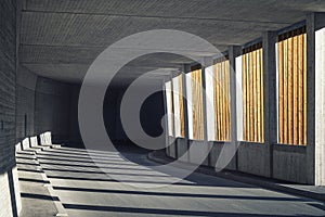 Avalanche gallery with wooden slats goes over into a dark concrete street tunnel