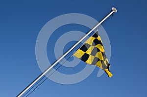 Avalanche hazard yellow and black checkered flag