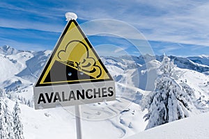 Avalanche sign in winter Alps with snow photo