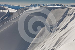 Avalanche about to descend from the mountains