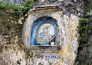 Ave Maria, Madonna and Child on the wall of a street in Sorrento, Italy.