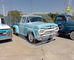 old light blue utility pickup truck Ford F 100 late 1950s. Expo Fierros 2021 classic car show