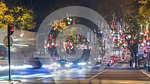 Avenida da Liberdade in Lisbon illuminated with lights hanging from the trees night timelapse. Portugal