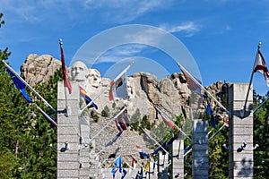 The Avenue of Flags at Mount Rushmore National Monument, USA. Sunny day, blue sky.