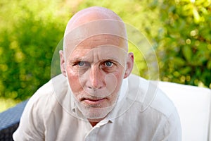 Average age man looks camera