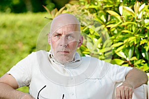 Average age man looks camera