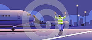 aviation marshaller supervisor near aircraft air traffic controller airline worker in signal vest professional airport photo