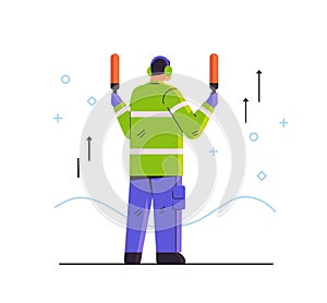aviation marshaller supervisor signaling near aircraft air traffic controller airline worker in signal vest professional photo