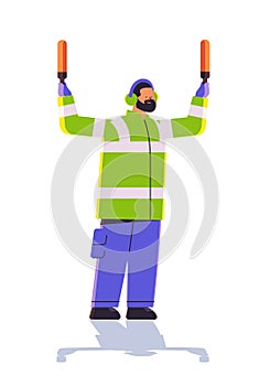 aviation marshaller supervisor signaling near aircraft air traffic controller airline worker in signal vest professional photo