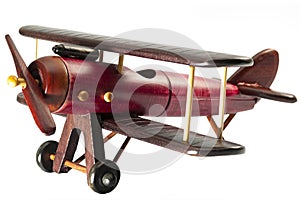 Aviation and transportation toys concept with wooden toy airplane isolated on white with clipping path