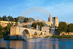 Avignon Bridge with Popes Palace and Rhone river at sunrise