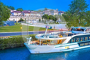 Avignon riverfront and boat on Rhone river view