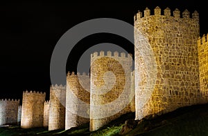 Avila at night, medieval city walls photo