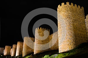 Avila at night, medieval city walls. Castile and Leon, Spain.