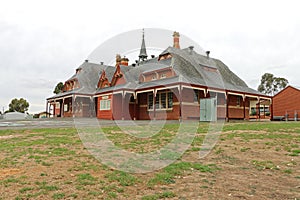 The Avoca primary school (1878) is a red brick building with a slate roof and verandah that encircles the building