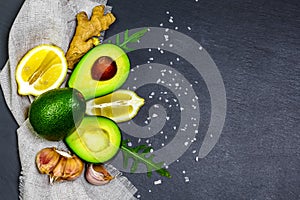 Avocado and avocado oil. fresh organic raw produce. Healthy food concept. Copy space Top view