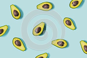 Avocado on the blue background. Top view