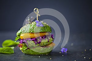 Avocado burger with green patty