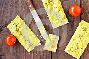 Avocado cream,biscuits and small tomatoes