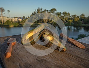 Avocado decorated on wood with wooden shovels