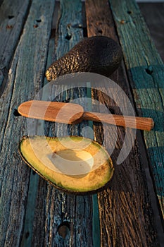 Avocado decorated on wood with wooden shovels