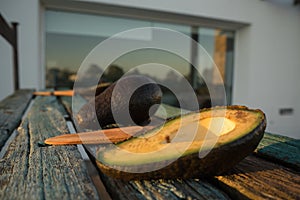 Avocado decorated on wood with wooden shovels