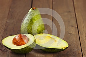 Avocado fruit on brown wooden old table