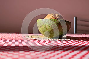 Avocado fruit at the dinner table, fruit concept image