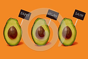 Avocado fruits and text happy vegan day