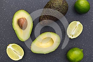 Avocado half on dark background