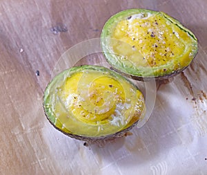 Avocado halves baked with eggs