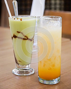 avocado juice and orange juice, enjoy the freshest on hot days photo