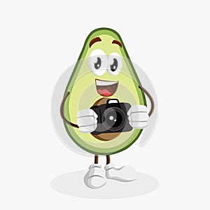 Avocado logo mascot with camera pose